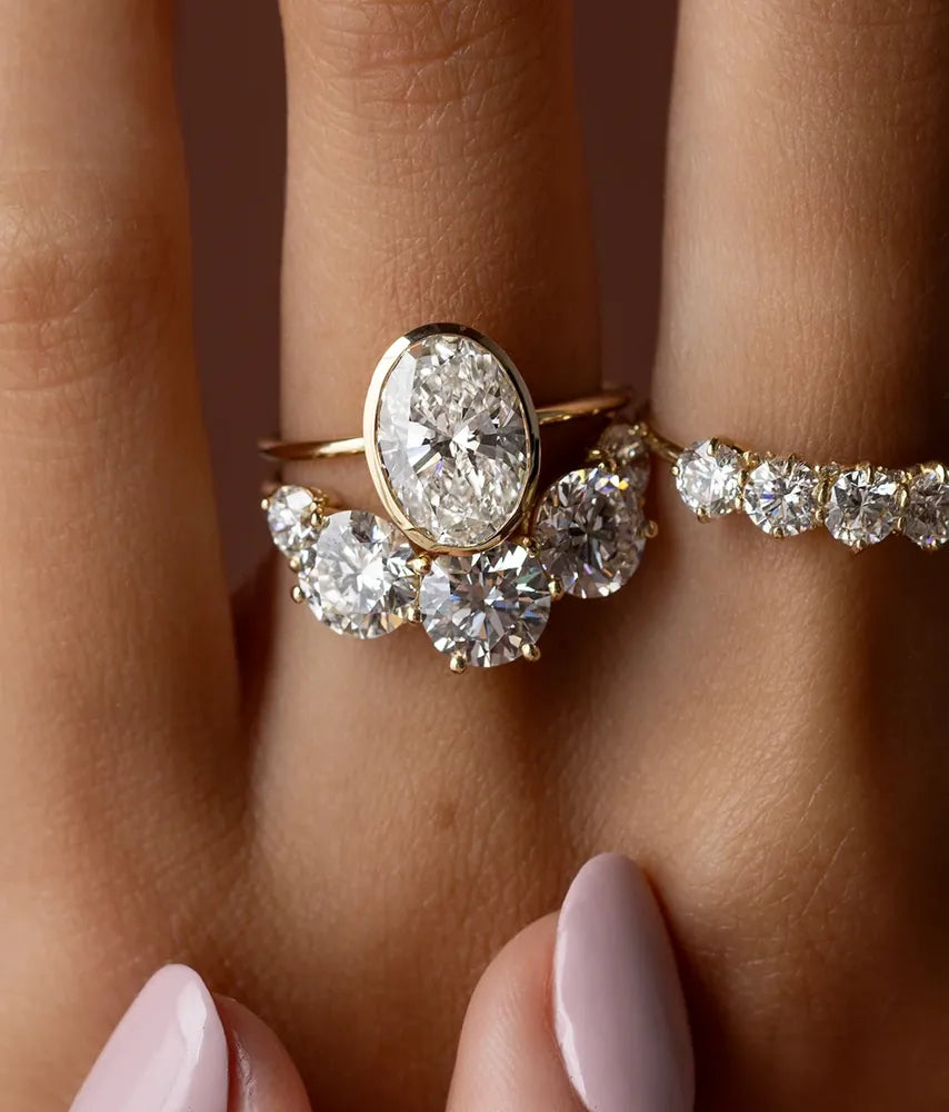 Oval diamond ring with a diamond band