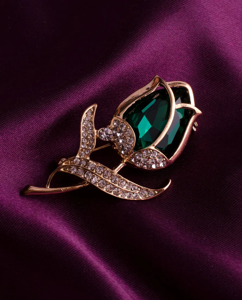 Estate emerald and diamond brooch on silk